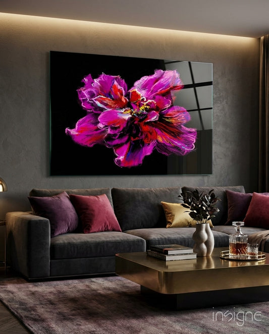 Magenta Bloom glass wall art displayed above a charcoal sectional in a contemporary lounge