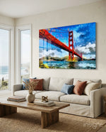 Golden Gate glass wall art displayed above a linen sofa in a coastal living room