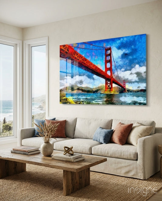 Golden Gate glass wall art displayed above a linen sofa in a coastal living room