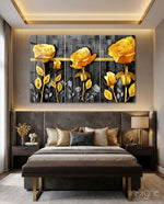 Yellow Roses glass wall art displayed above an upholstered headboard in a luxe-grey bedroom