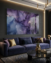 Amethyst Veil glass wall art displayed above a navy velvet sofa in a charcoal-walled lounge