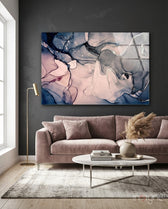 Indigo Blush glass wall art displayed above a mauve velvet sofa in a warm minimalist lounge