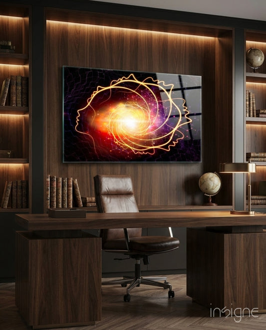 Galaxy Spiral glass wall art displayed above a walnut desk in a library-paneled study