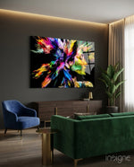 Two Minds glass wall art displayed above a walnut sideboard in a charcoal lounge with green velvet sofa