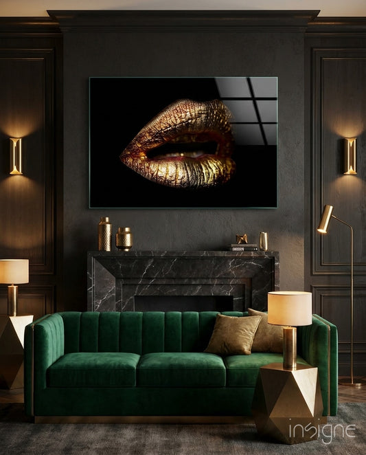 Gold Lips glass wall art displayed above a black-marble fireplace in a charcoal-paneled lounge