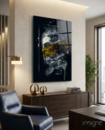 Gilded Poseidon glass wall art displayed above a walnut credenza in a warm beige minimalist lounge