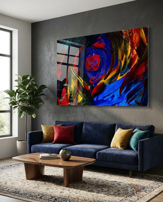 Cobalt Vortex glass wall art displayed above a navy velvet sofa in a charcoal-walled lounge