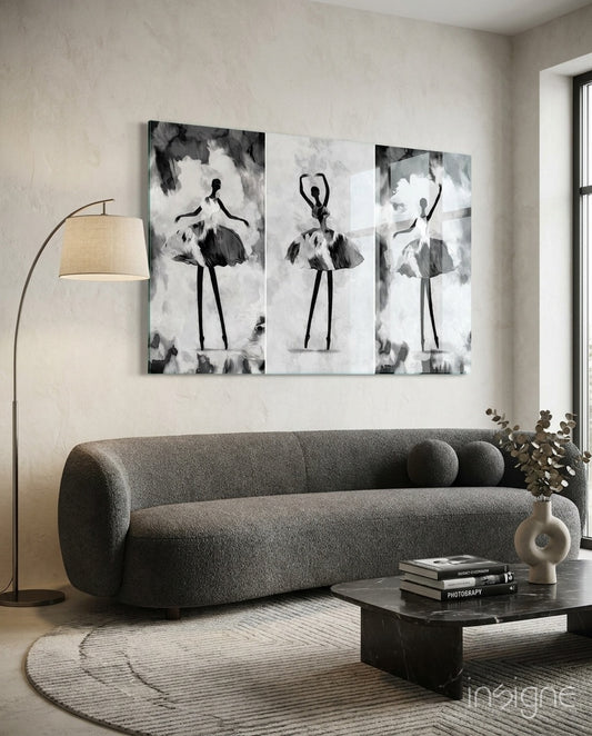 Ballet Triptych glass wall art displayed above a curved bouclé sofa in a warm minimalist living room