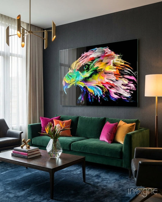 Vivid Eagle glass wall art displayed above an emerald velvet sofa in a charcoal lounge with brass chandelier