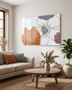 Scandi Bloom glass wall art displayed above a linen sofa in a warm minimalist living room