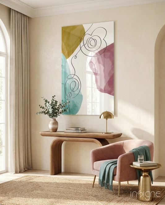 Pastel Drift glass wall art displayed above a wood console in a warm classical entryway with blush armchair