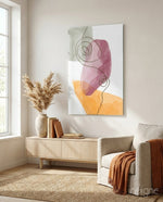 Mauve Stack glass wall art displayed above a wood credenza in a warm minimalist nook