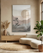 Nordic Hills glass wall art displayed above a wood credenza in a warm minimalist living room with bouclé sofa