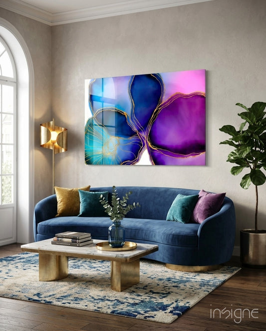 Jewel Bloom glass wall art displayed above a navy velvet sofa in a classical lounge with brass lamp