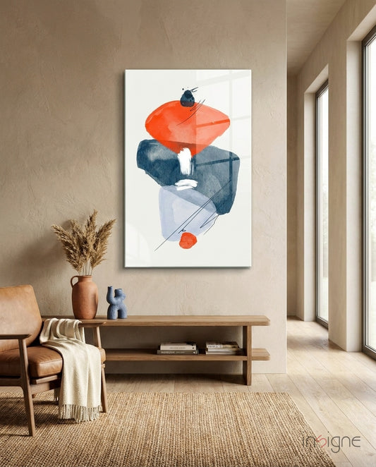 Orange Wabi glass wall art displayed above a wood bench in a warm minimalist lounge with cognac armchair
