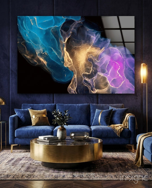 Cosmic Trio glass wall art displayed above a navy velvet sofa in a navy-walled lounge with brass coffee table