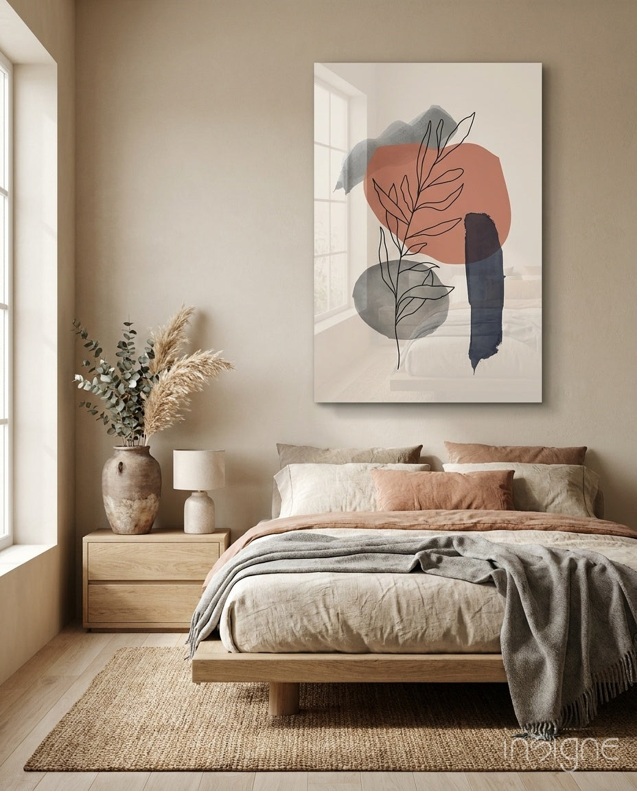 Leaf Branch glass wall art displayed above an upholstered headboard in a warm beige bedroom
