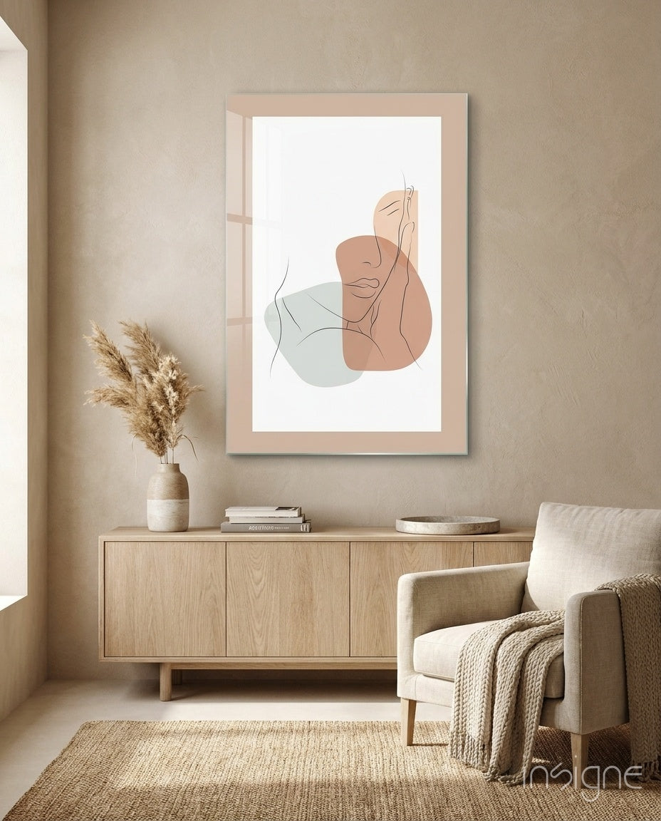 Couple Line glass wall art displayed above a wood console in a warm beige minimalist hallway