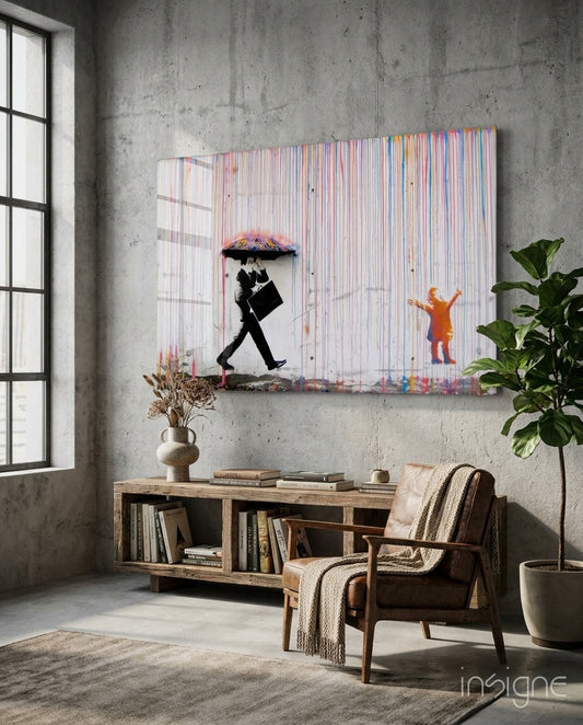 Color of Rain glass wall art displayed above a wood low credenza in an industrial concrete-walled lounge with leather chair