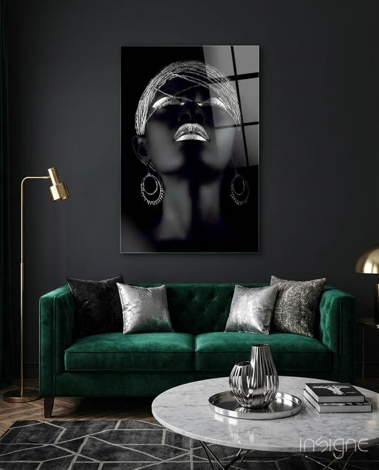 Silver Crown glass wall art displayed above an emerald velvet sofa in a charcoal-walled lounge with brass lamp