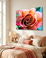 Coral Rose glass wall art displayed above a blush-linen bed in a bright minimalist bedroom