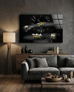 Tribal Spirit glass wall art displayed above a walnut credenza in a warm wood-paneled lounge with grey velvet sofa