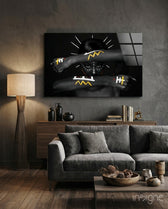 Tribal Spirit glass wall art displayed above a walnut credenza in a warm wood-paneled lounge with grey velvet sofa