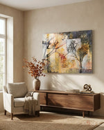 Autumn Manuscript glass wall art displayed above a walnut credenza in a warm beige minimalist nook with cream chair