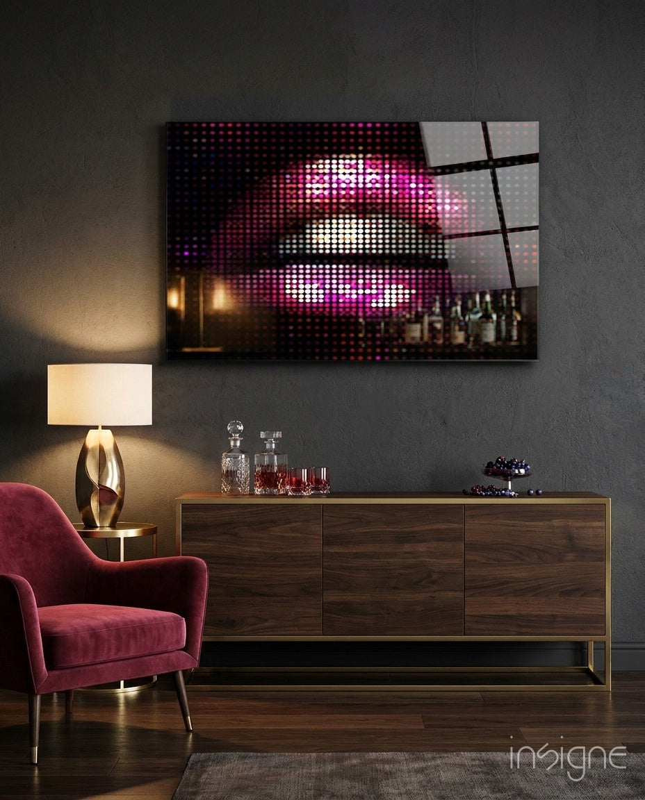 Pixel Lips glass wall art displayed above a walnut bar console in a charcoal-walled lounge with crimson velvet chair