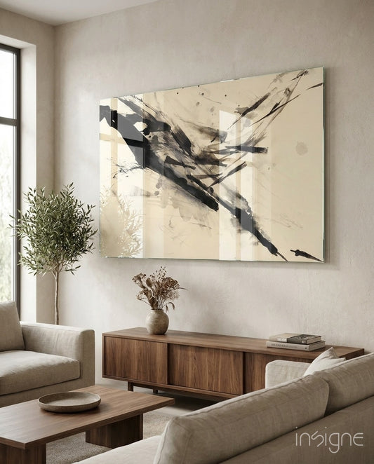 Sumi Ink glass wall art displayed above a walnut credenza in a warm minimalist lounge with linen sectional