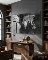 Chalkboard Map glass wall art displayed above a walnut desk in a dark wood-paneled office with cognac chairs