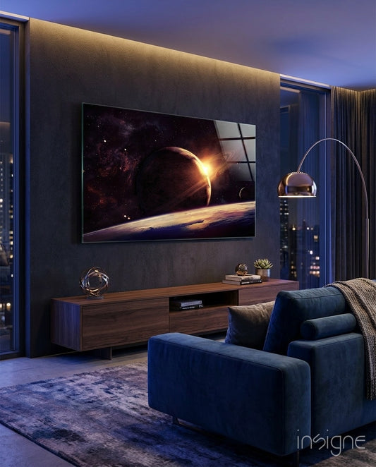 Ringed Planet glass wall art displayed above a wood low credenza in a dark luxe city-view lounge with navy velvet sofa