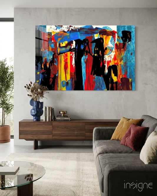 Festival Walk glass wall art displayed above a walnut credenza in a warm concrete-walled lounge with charcoal sofa