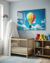 Sky Balloon glass wall art displayed above a wood crib in a soft blue nursery with stuffed animals
