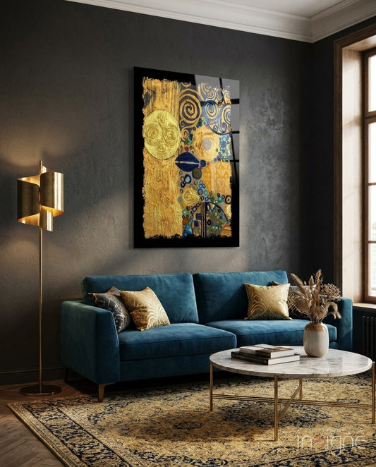 Golden Klimt glass wall art displayed above a teal velvet sofa in a dark navy lounge with gold floor lamp