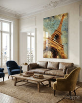 Paris Poster glass wall art displayed above a brown leather sofa in a classical Parisian apartment with herringbone floor