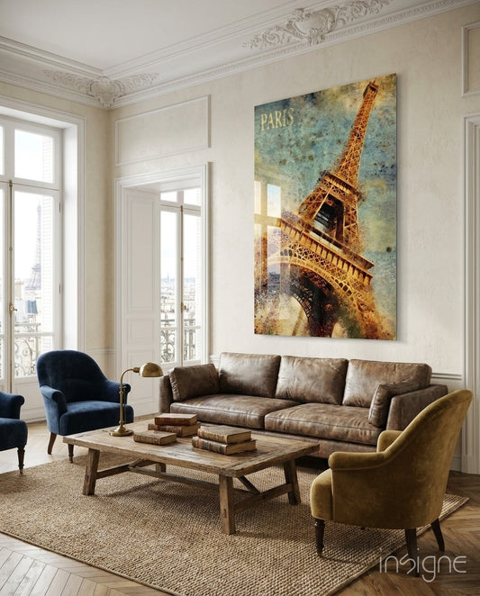Paris Poster glass wall art displayed above a brown leather sofa in a classical Parisian apartment with herringbone floor