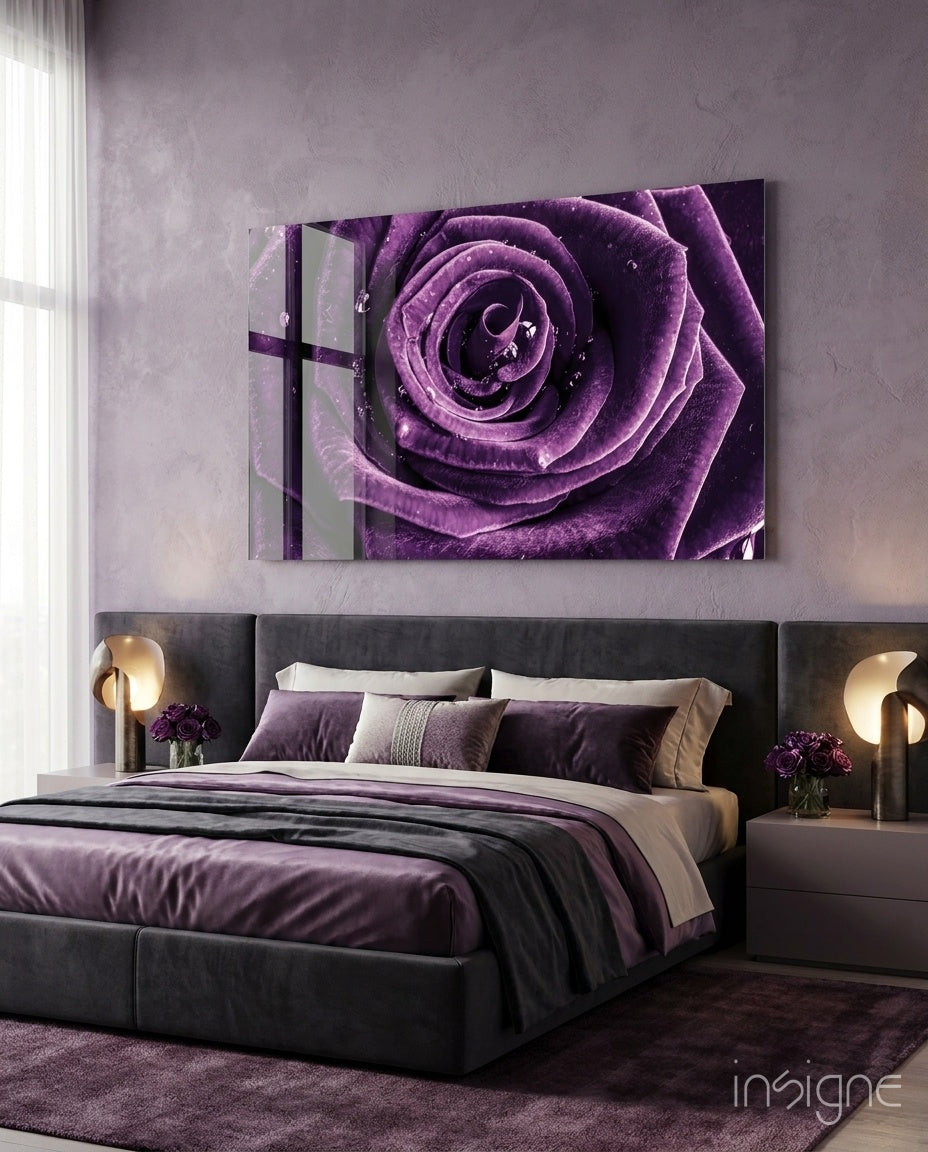 Purple Rose glass wall art displayed above an upholstered headboard in a lavender-walled bedroom with purple bedding