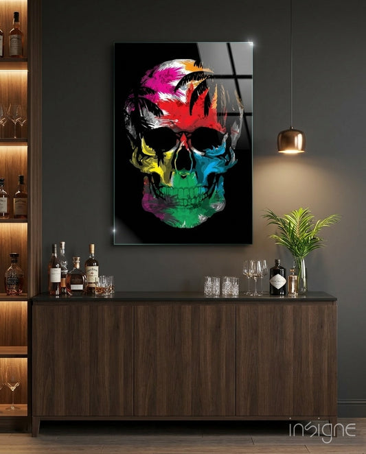 Rainbow Skull glass wall art displayed above a walnut bar console in a dark luxe lounge with mood-lit shelving