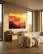 Amber Ridges glass wall art displayed above a wood console in a warm beige minimalist living room with bouclé sofa