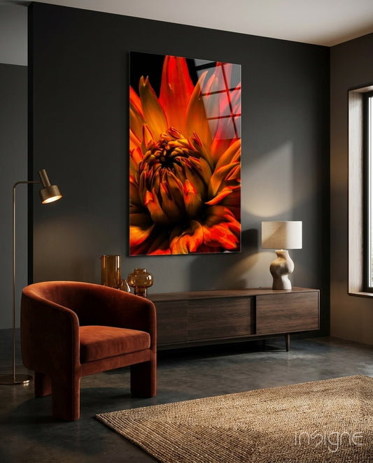 Fire Dahlia glass wall art displayed above a wood credenza in a dark grey lounge with rust velvet armchair