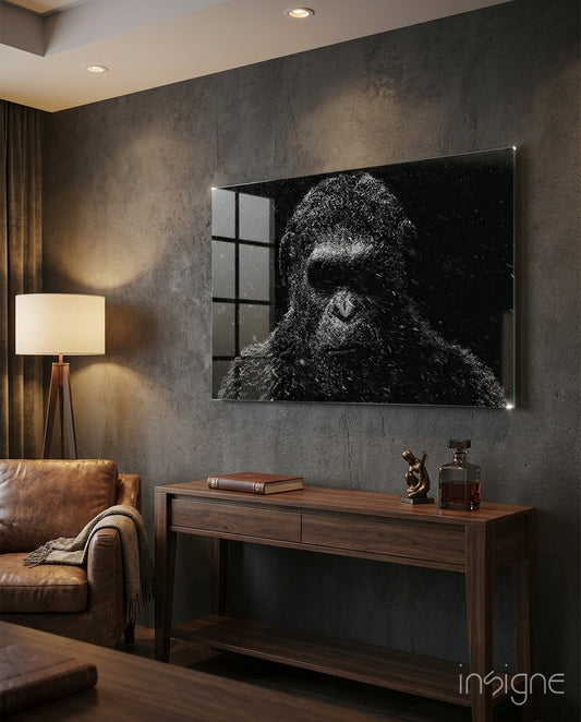 Snow Gorilla glass wall art displayed above a walnut credenza in a warm grey lounge with cognac sofa