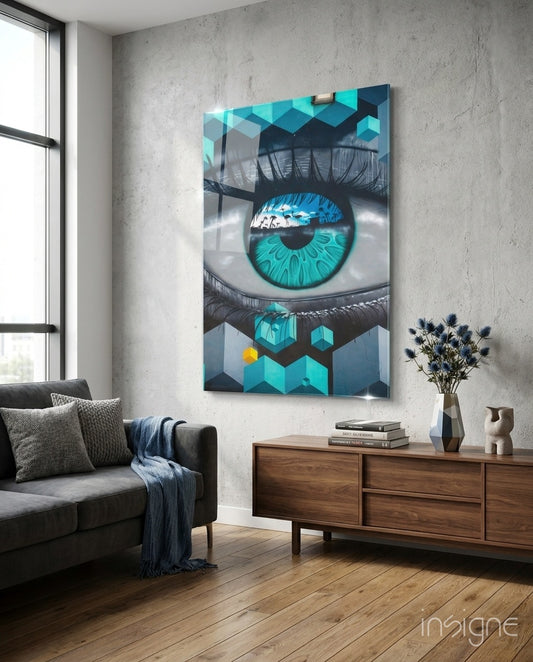 Cubist Eye glass wall art displayed above a wood credenza in a warm minimalist concrete-walled lounge with charcoal sofa