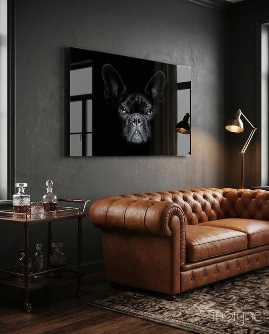 Frenchie Portrait glass wall art displayed above a brown chesterfield sofa in a dark grey lounge with bar cart