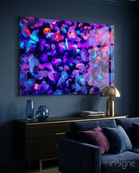 Neon Jellies glass wall art displayed above a walnut credenza in a dark navy lounge with navy velvet sofa