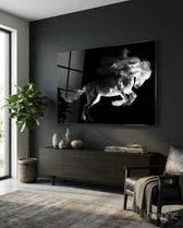 Horse glass wall art displayed above a dark wood credenza in a moody charcoal-walled lounge with leather armchair and fiddle leaf fig