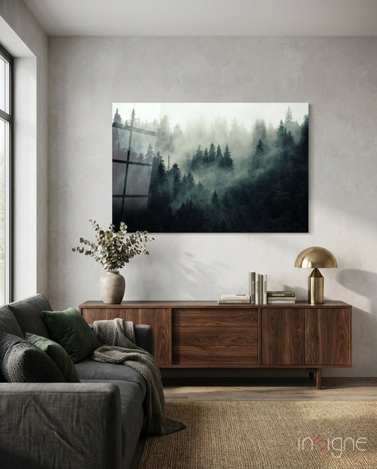 Landscape of Darkness glass wall art displayed above a walnut credenza in a soft white-walled lounge with charcoal sofa and eucalyptus vase