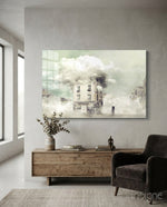 Fog glass wall art displayed above a reclaimed wood console in a soft white-plaster lounge with charcoal armchair and eucalyptus vase