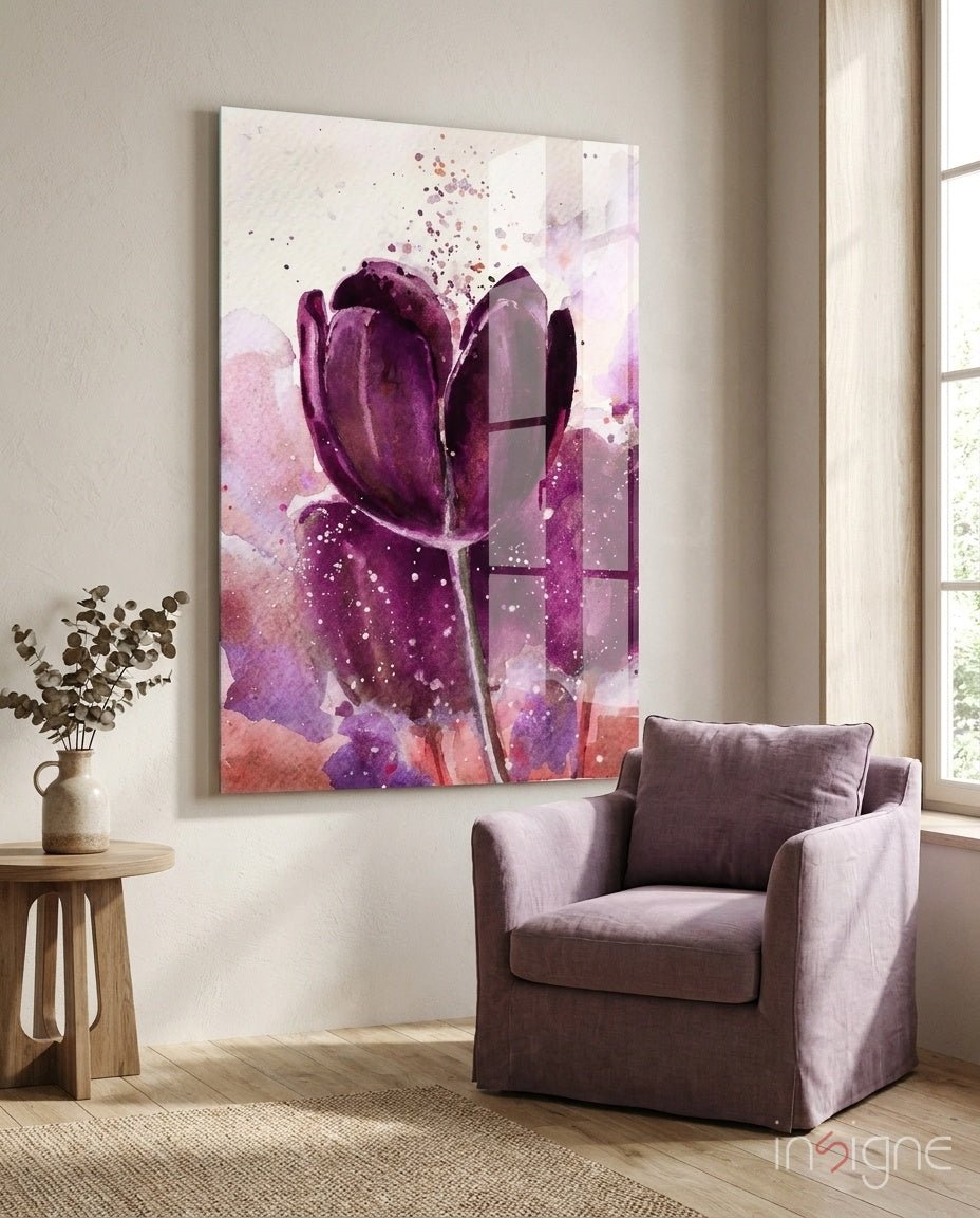 Tulip glass wall art displayed beside a mauve linen armchair in a soft white-plaster lounge with eucalyptus pitcher