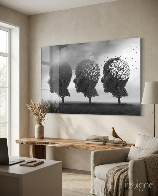 Autumn of Thoughts glass wall art displayed above a live-edge wood console in a soft beige-plaster study with linen armchair and pampas vase